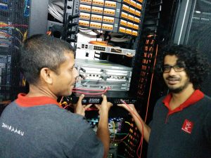 Dhiraagu team installing the RIPE Atlas Anchor in their NOC