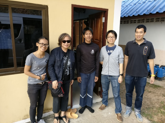 Professor Kanchana (second left) and her team at AIT and a local technician (centre) with Adisorn Lertsinsrubtavee (second right) from the N4D Lab.