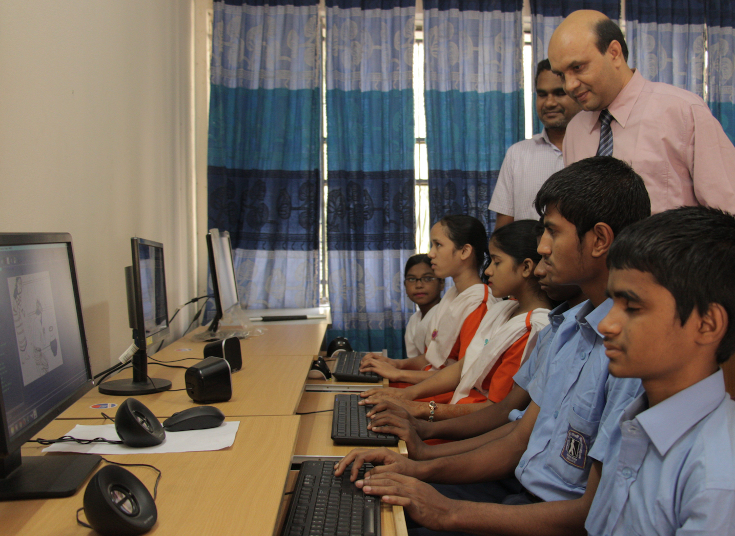 Bhattacharjee taking a class for visually impaired children.