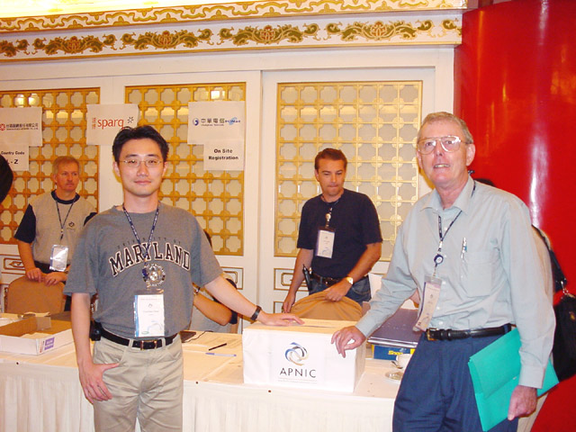 Chia-Nan Hsieh and John Earls at the 12th APNIC Open Policy Meeting.