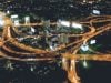 header image: aerial view of highway system at night