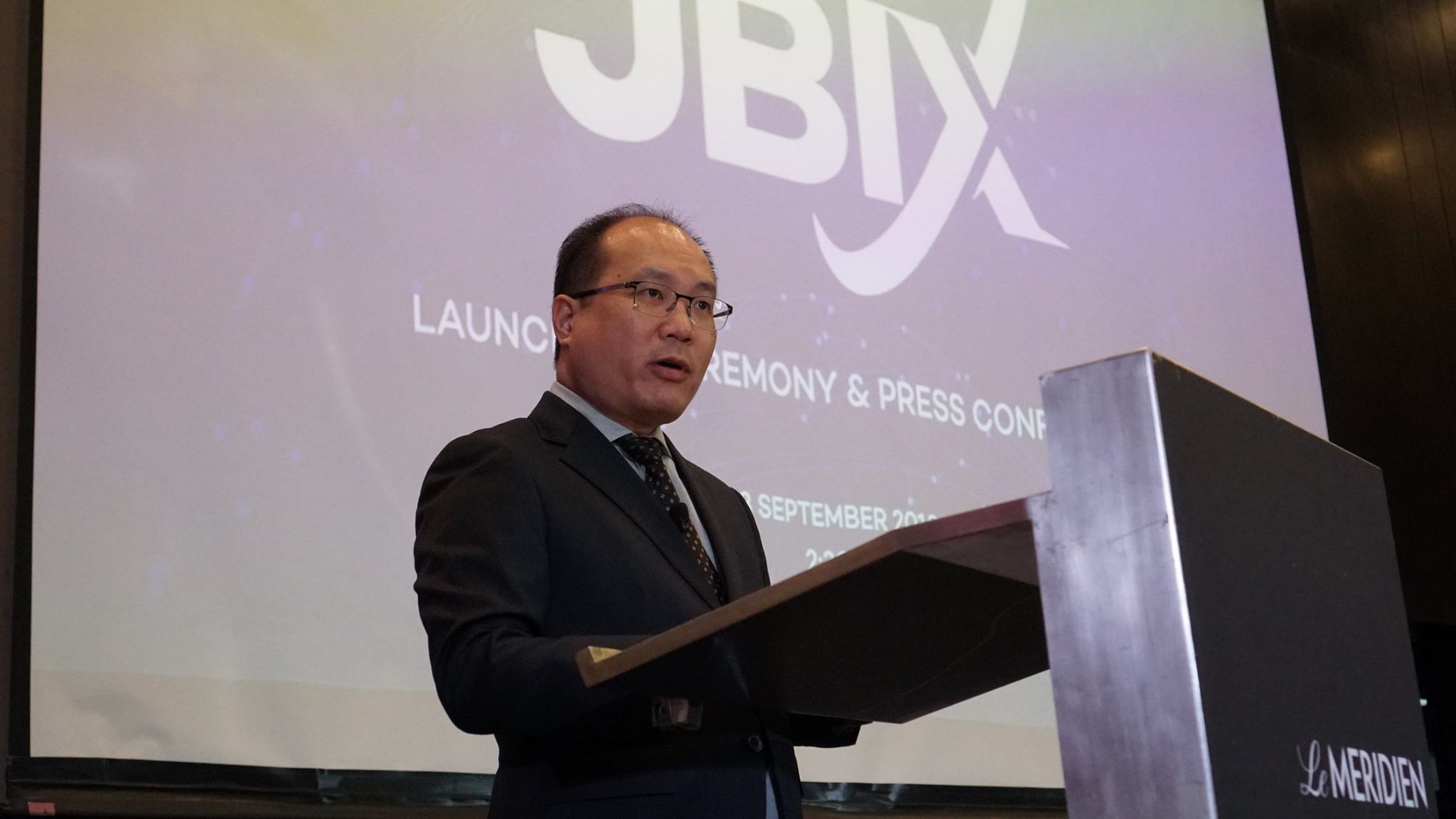 Weng Yew Wong speaking at the launch of JBIX.