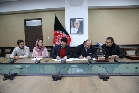 Photo of NIXA team members Sherafzal Yousifzai, Sahil Mushref and Mohammad Zahid Stanikzai during signing agreement with Ariana Network Services.