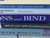 Networking books stacked