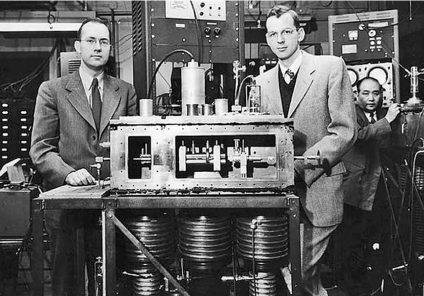 Photo of Charles Townes (left) with the MASER he developed in 1954.