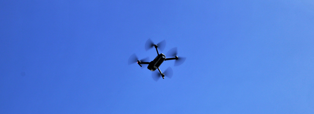 Transiting UAVs in aerial mesh networks