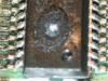 A burned out DIP packaged integrated circuit