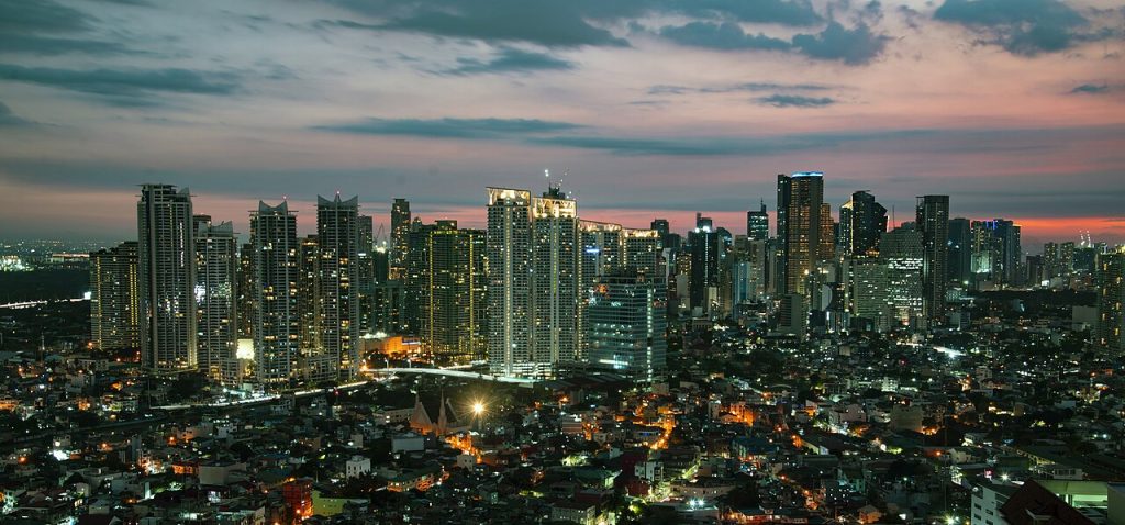 Manila Makati at Twilight Metro Manila Skyline, Philippines.