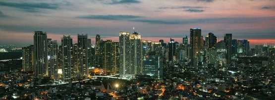 Manila Makati at Twilight Metro Manila Skyline, Philippines.