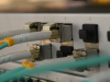 Some network cables plugged into a switch.