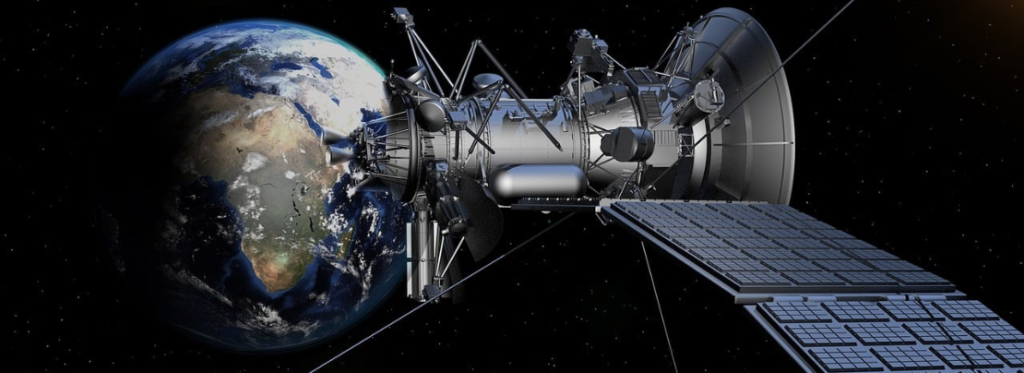 A satellite in front of Earth.