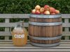 Image of a barrel of apples next to a jug of CIDR